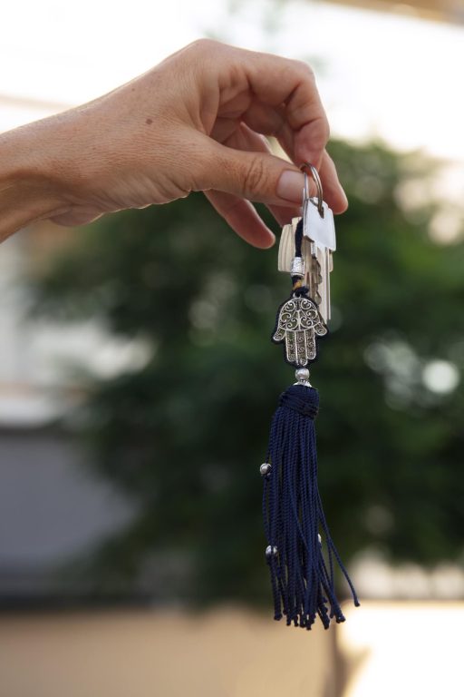 hand-holding-key-outdoors-supaqua